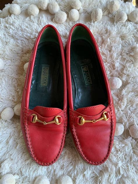 red gucci dress shoes.